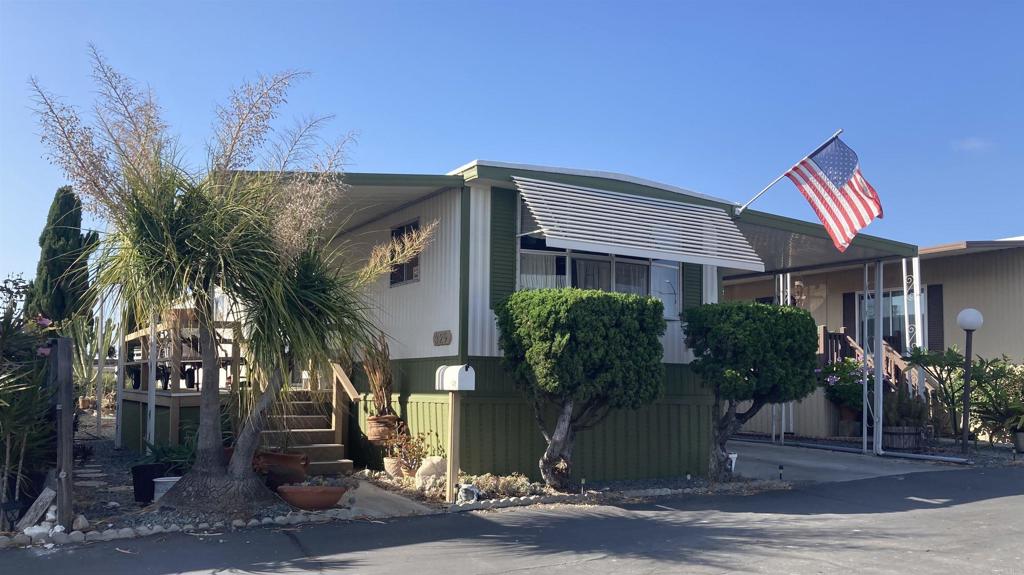 a front view of house with a yard