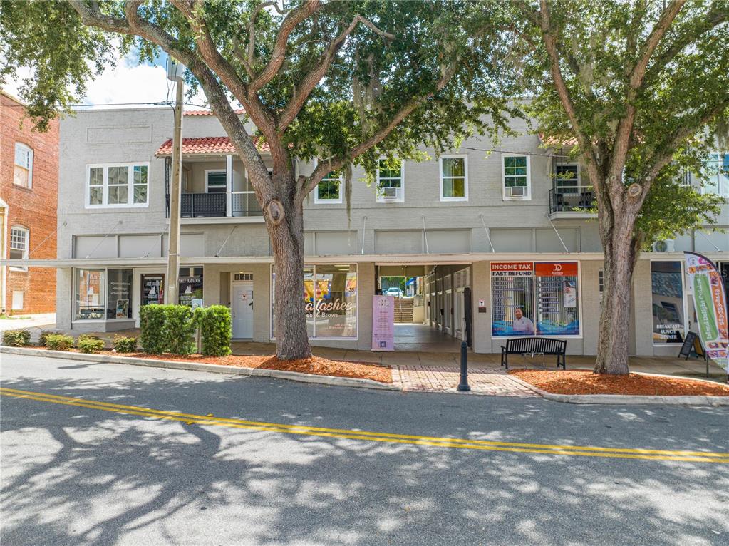 a front view of a building with street view