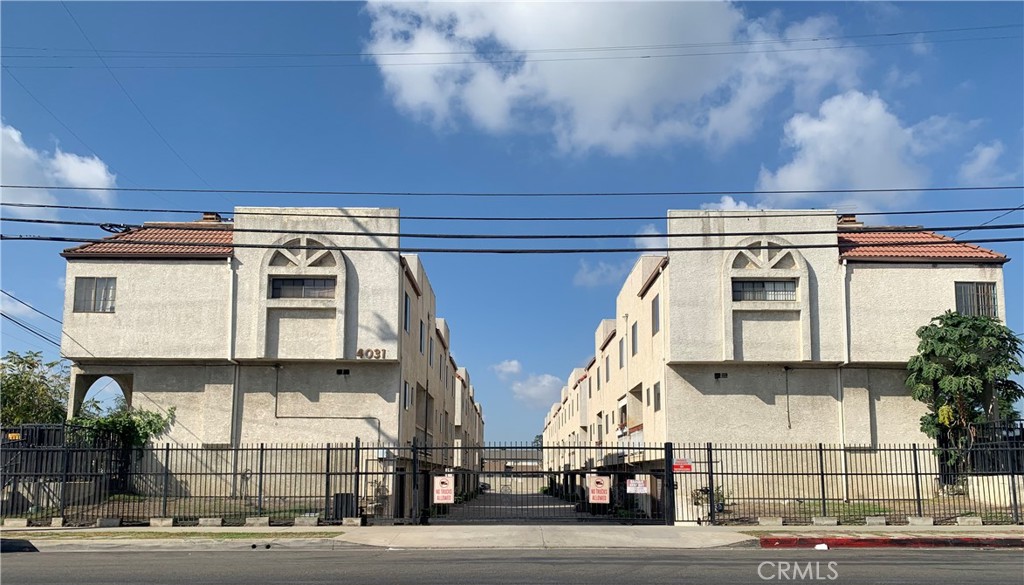 a view of a building with a street