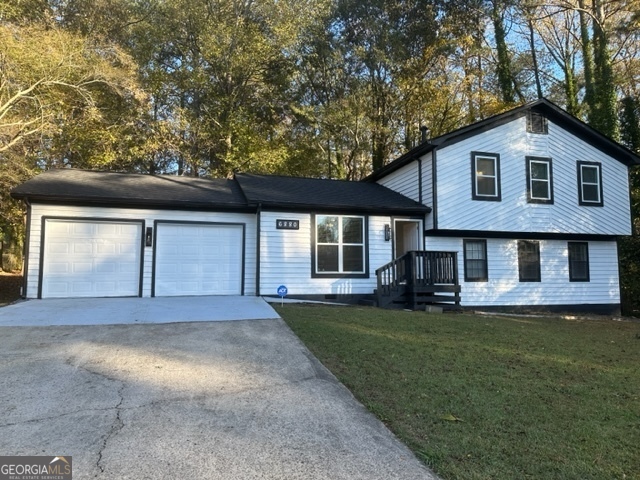 front view of a house with a yard