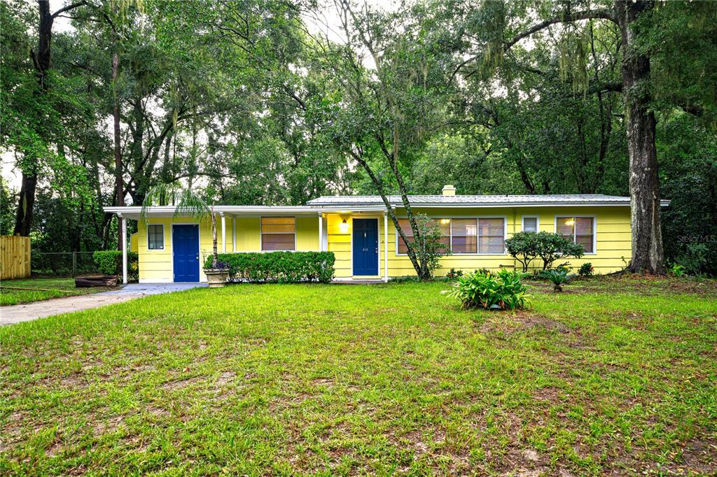 front view of a house with a yard