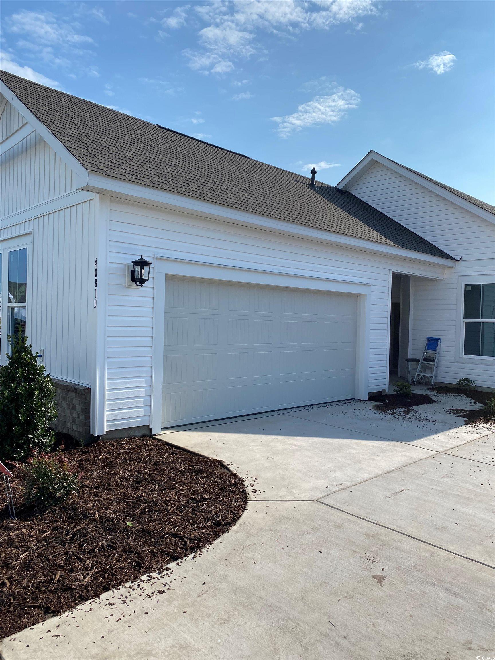 Exterior space featuring a garage