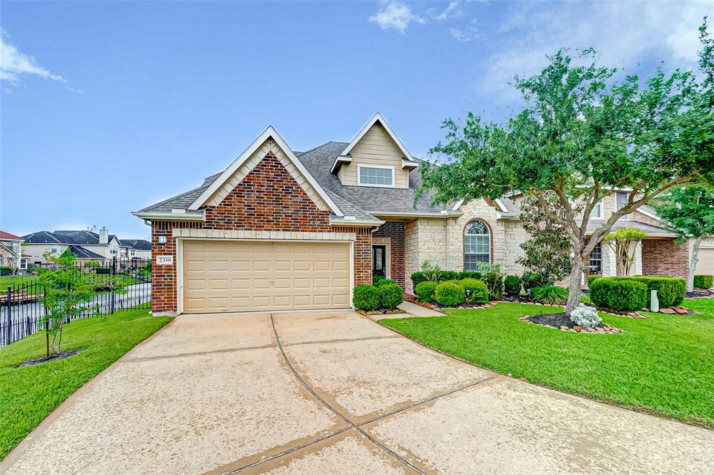 Beautiful lakefront home at the end of the cul-de-sac.