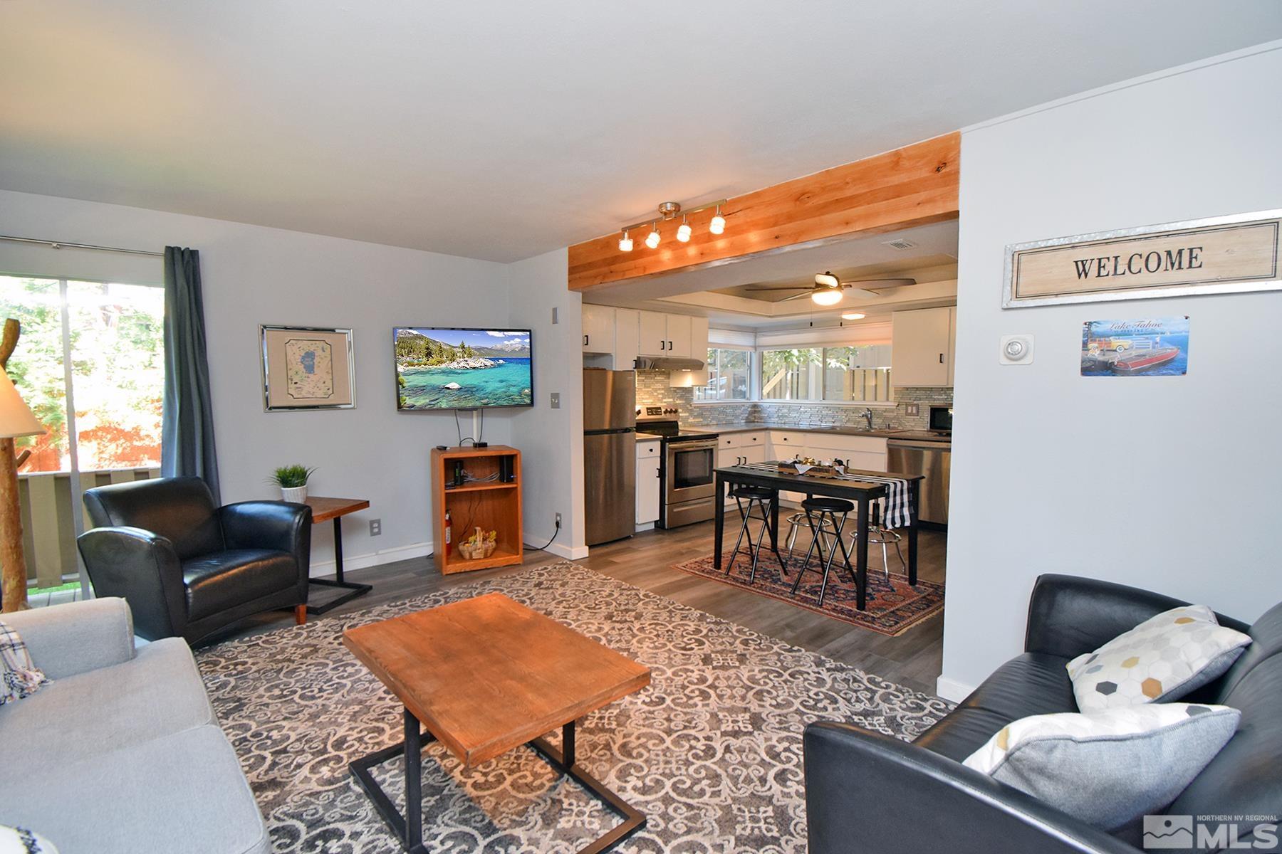 a living room with furniture and a table