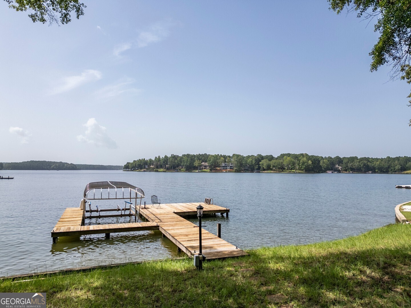 a lake view with a bench and lake view