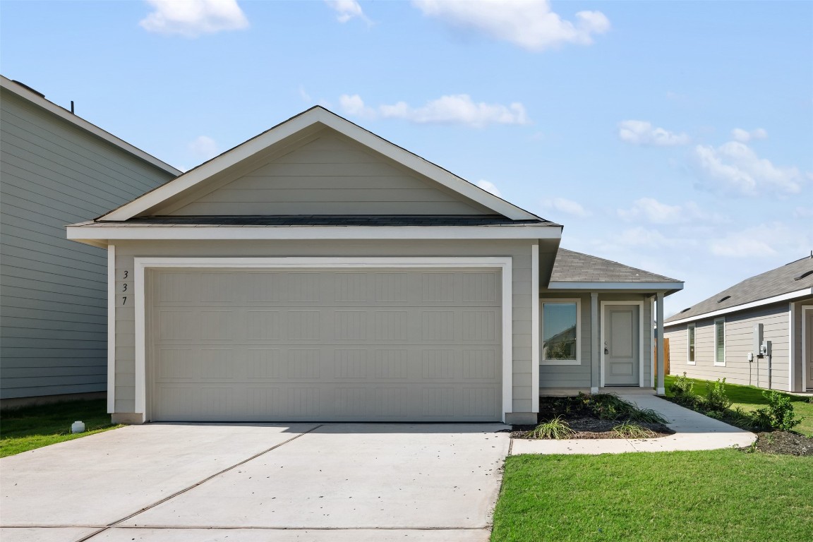 a front view of house with yard