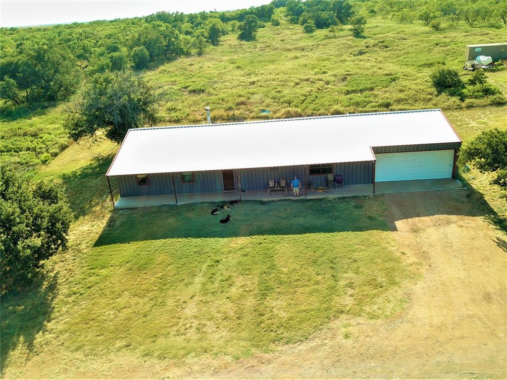 a view of swimming pool with a yard