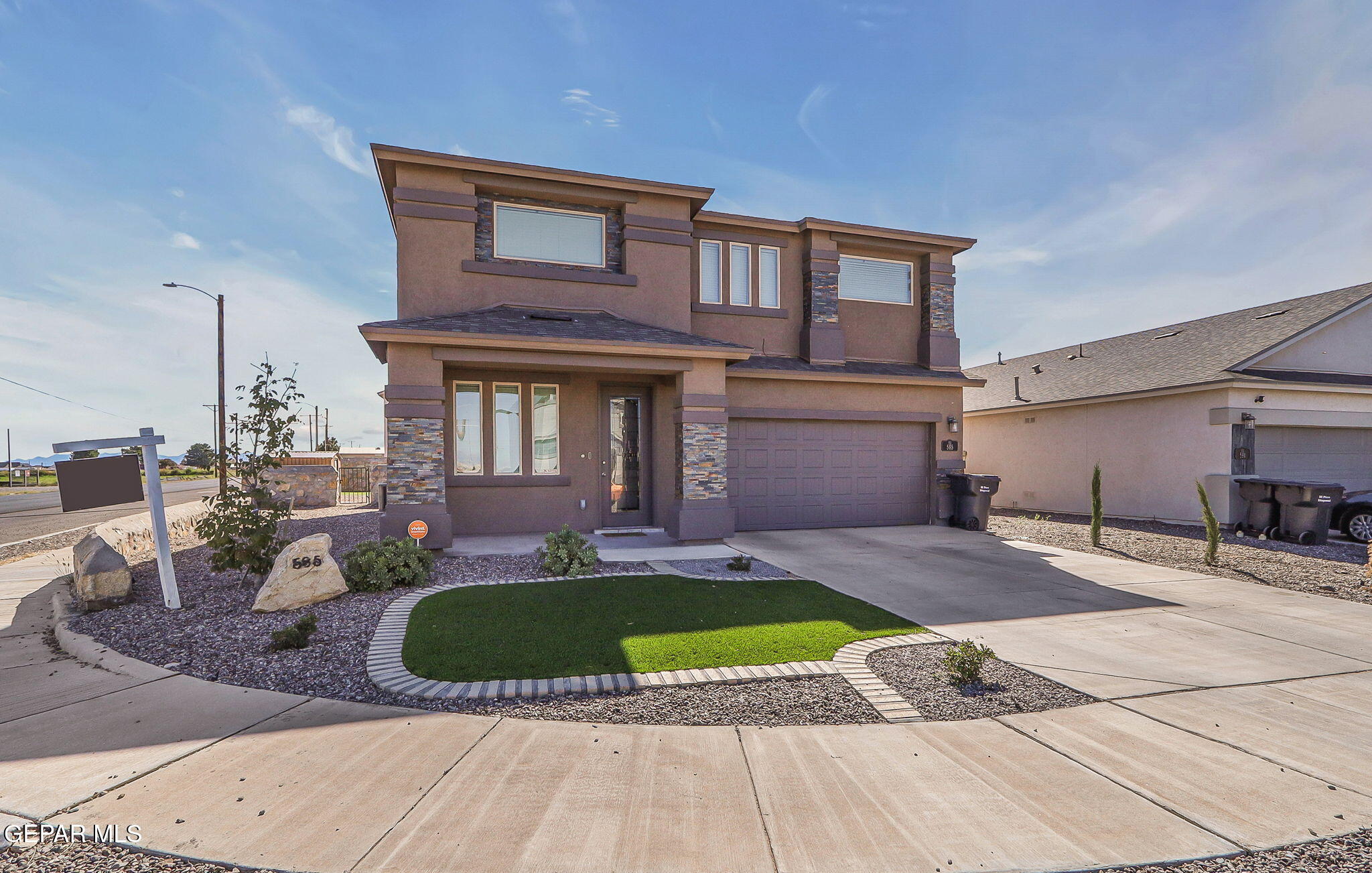 a house view with a outdoor space