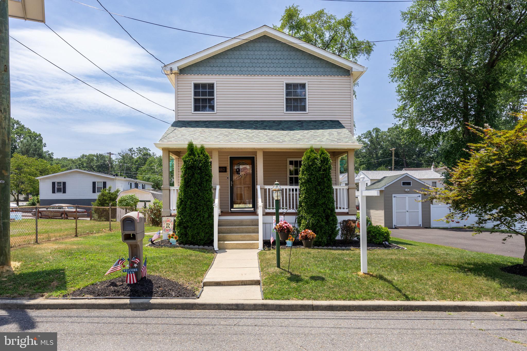 a front view of house with yard