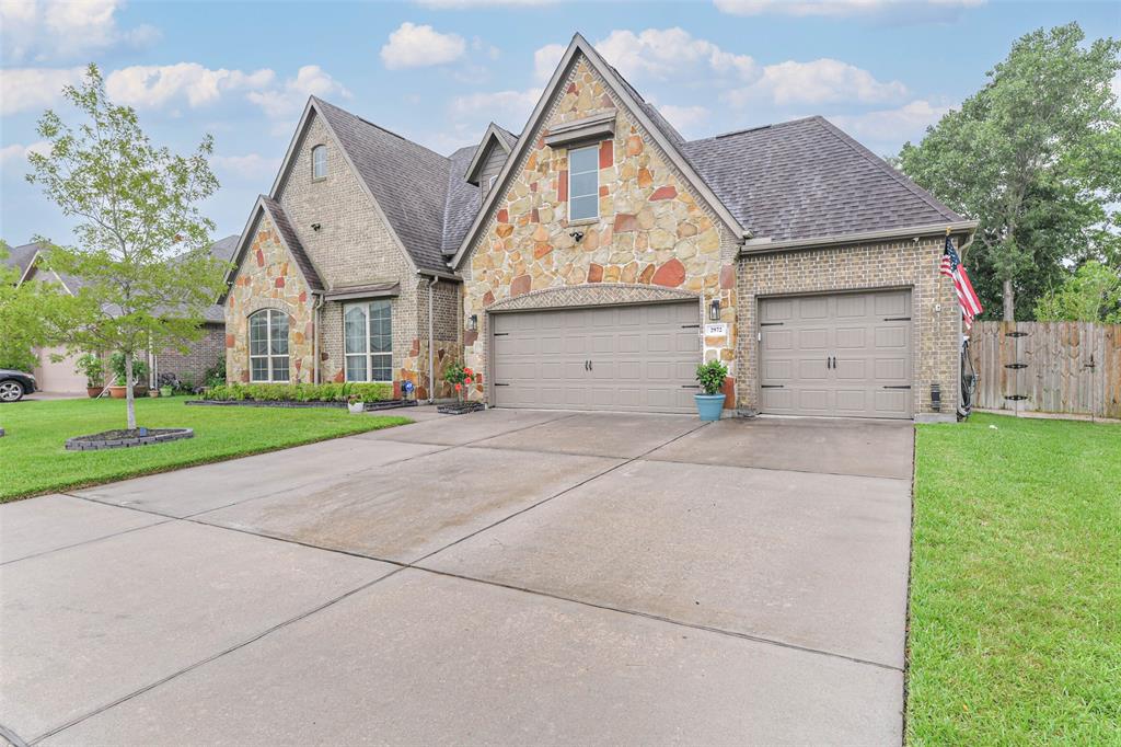 a view of house and outdoor space with yard