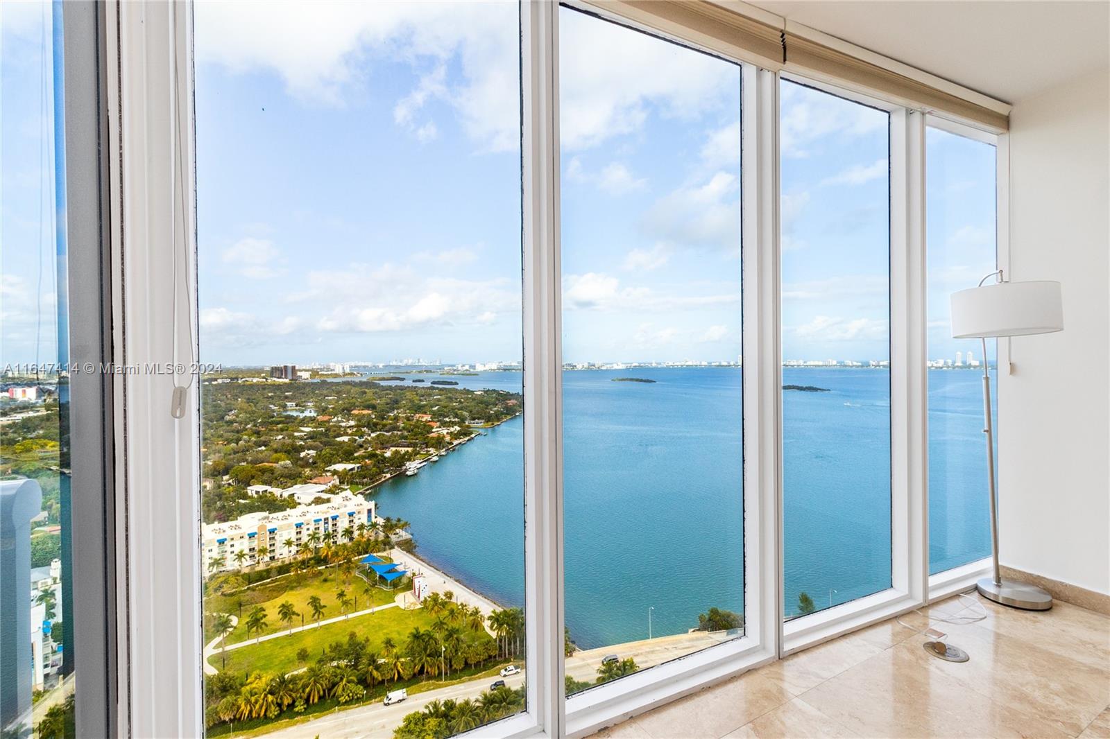 a view of a glass door and a window