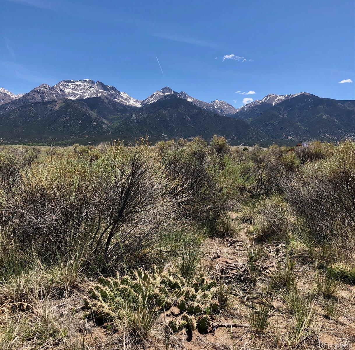 a view of mountains and valleys