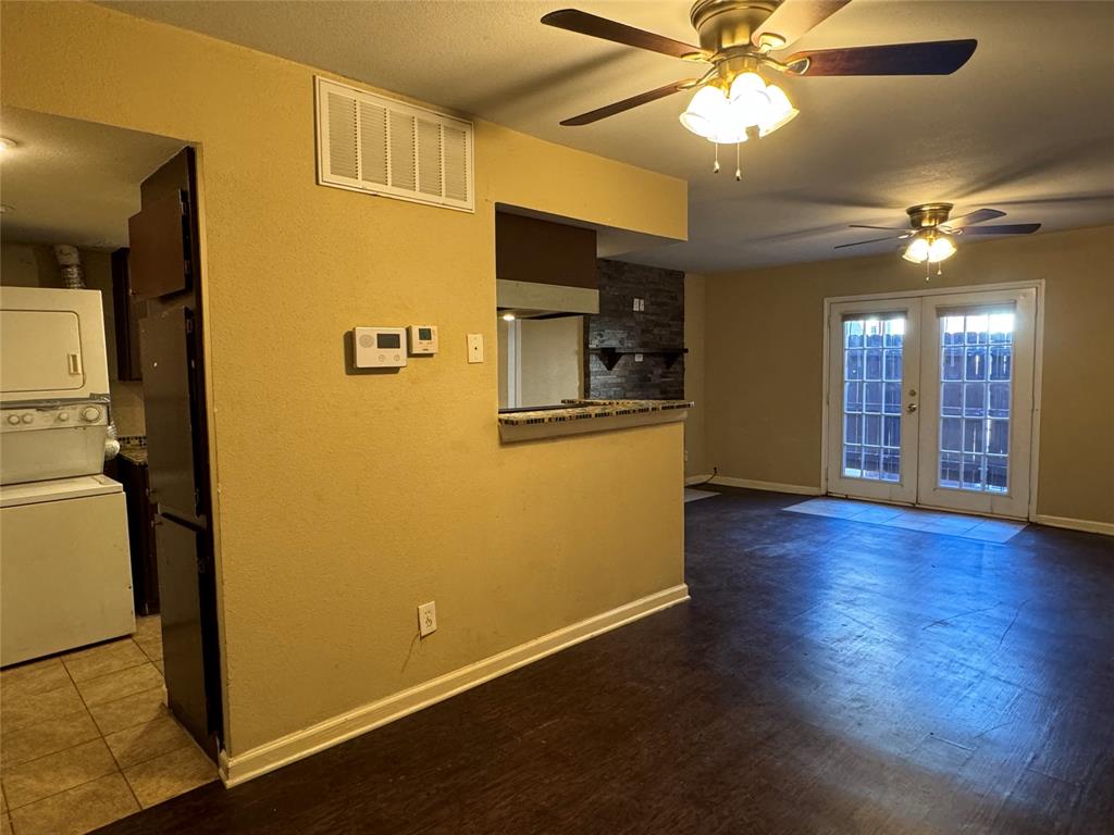 a view of a livingroom with a flat screen tv