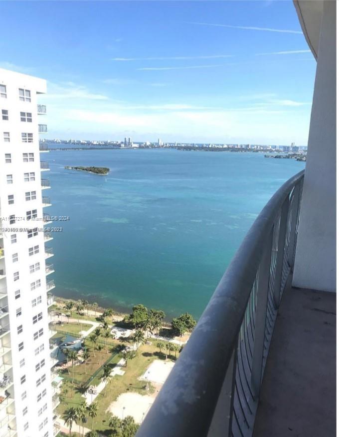 a view of balcony with ocean view