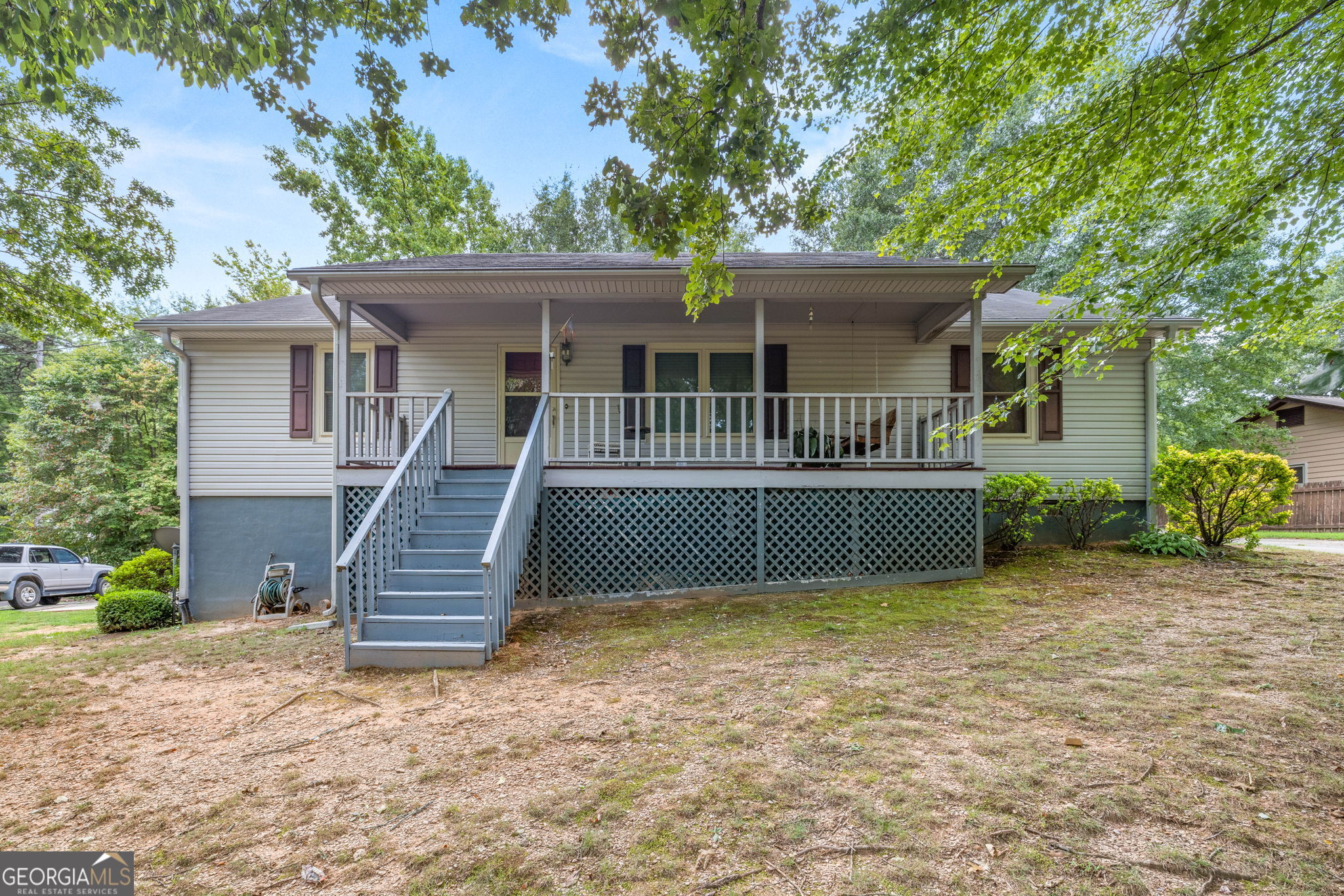 front view of a house with a yard