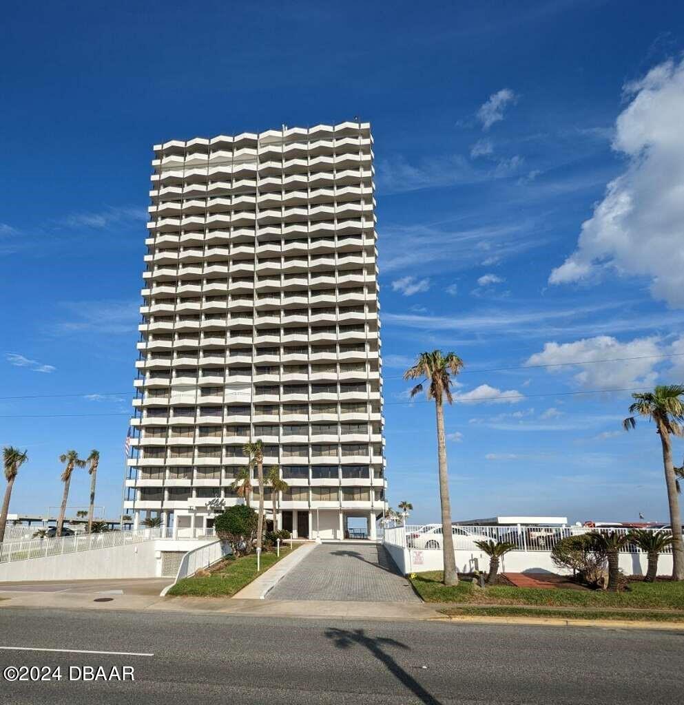 a front view of a building with street view