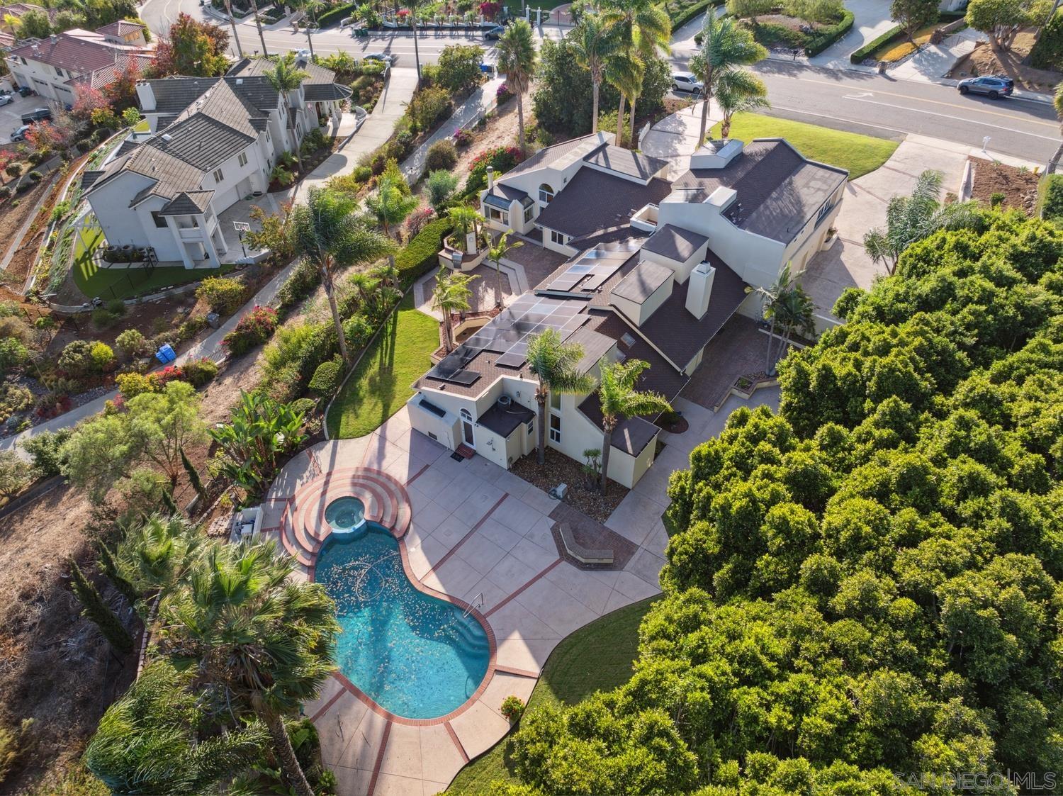 an aerial view of residential house with outdoor space