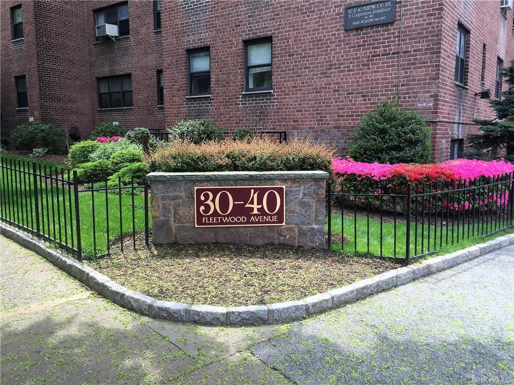 Community sign with a lawn