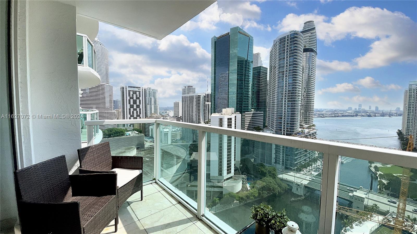 a view of balcony with furniture