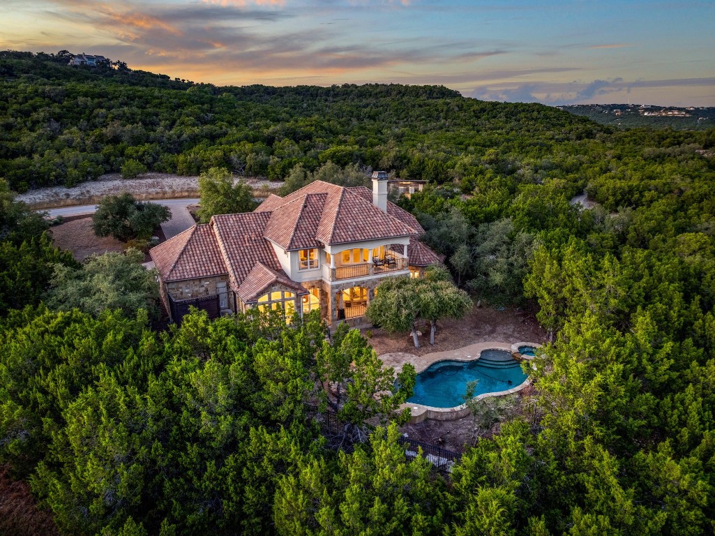 an aerial view of a house with garden space and outdoor space