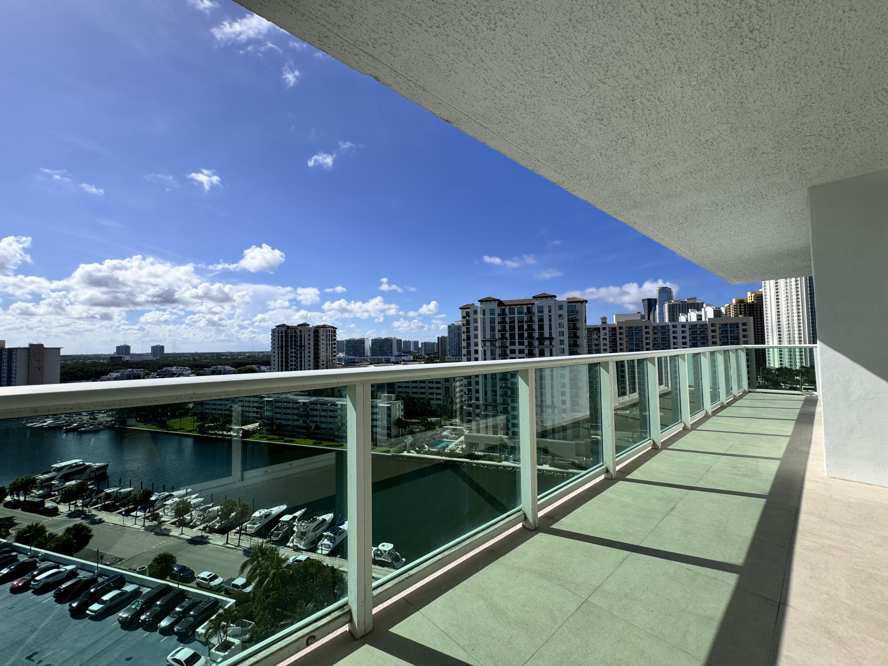 a view of a balcony with chairs