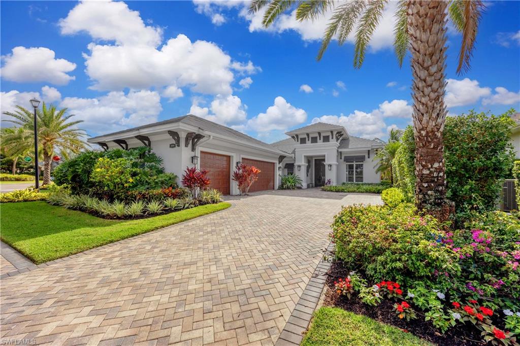 View of front of property featuring a garage