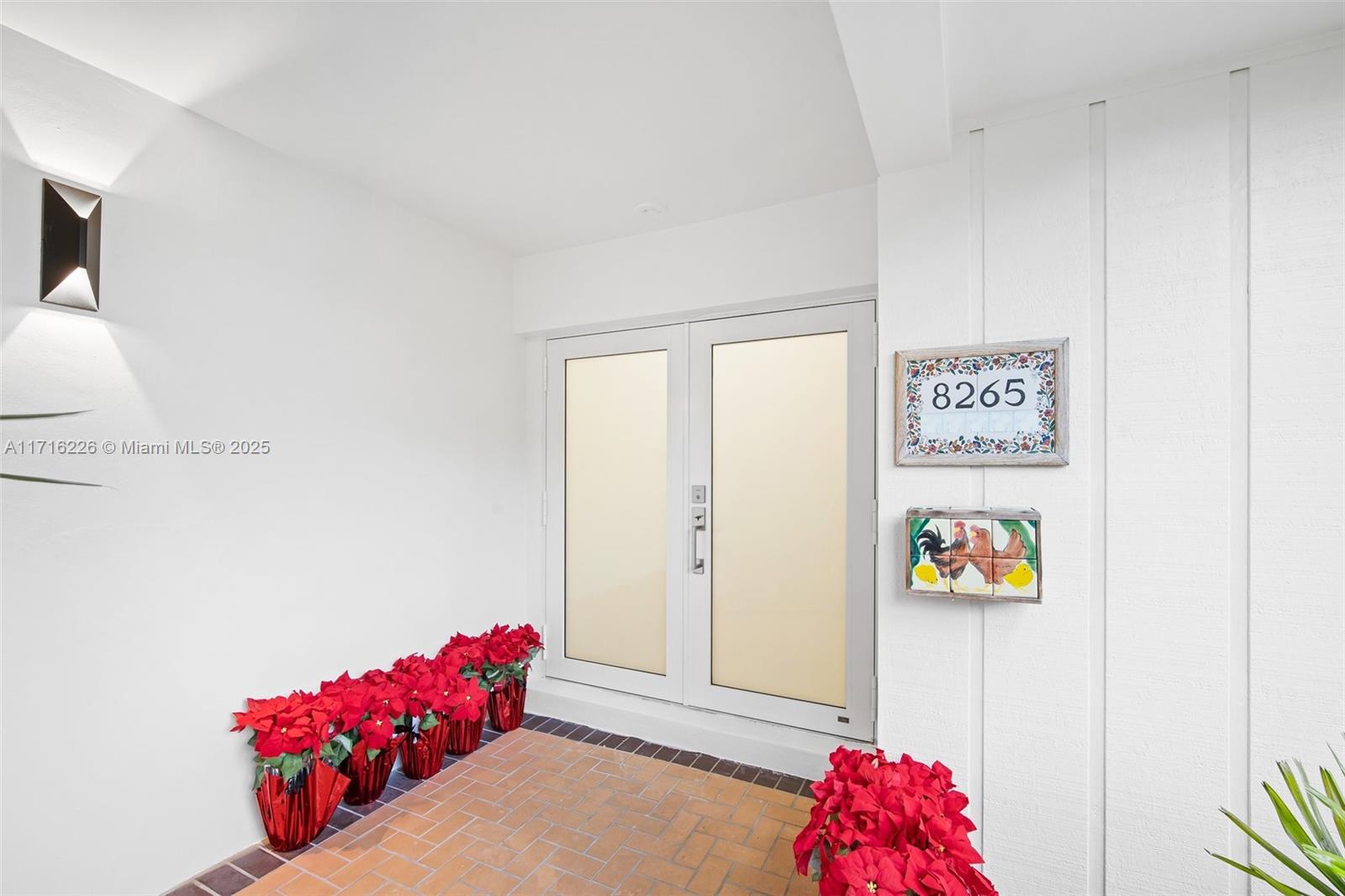 a hallway with toys and flowers