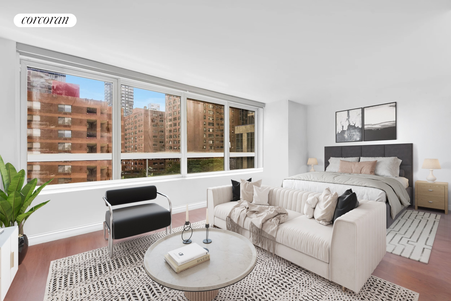 a balcony with furniture and a large window