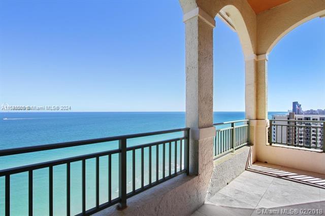 a view of balcony with two chairs