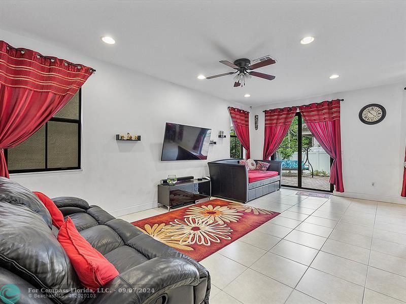 a living room with a couch and a flat screen tv