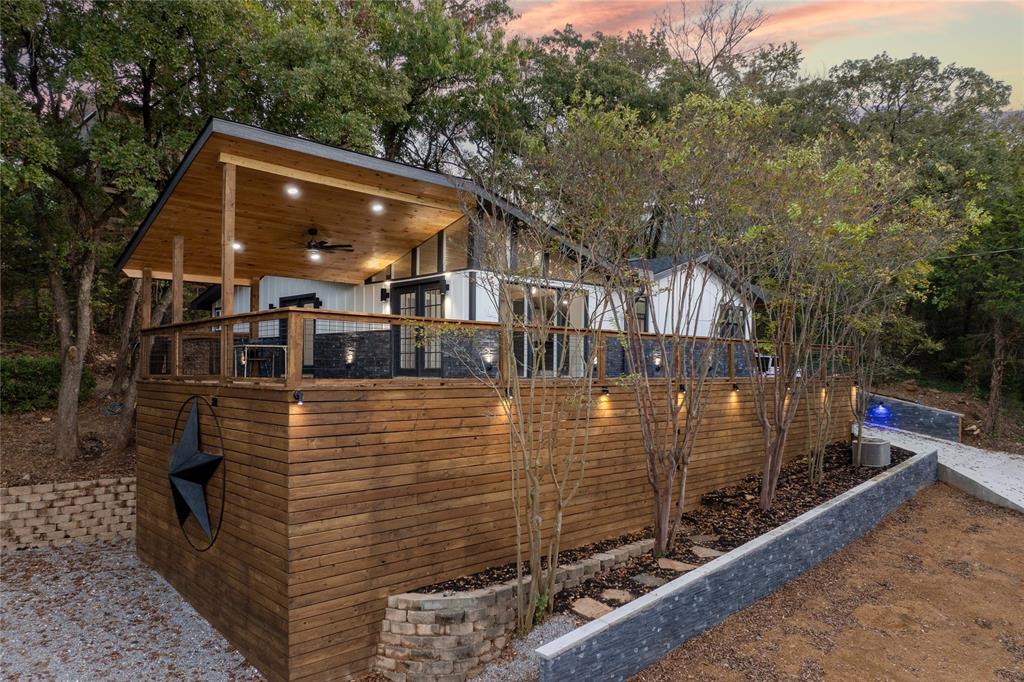 a front view of a house with parking area