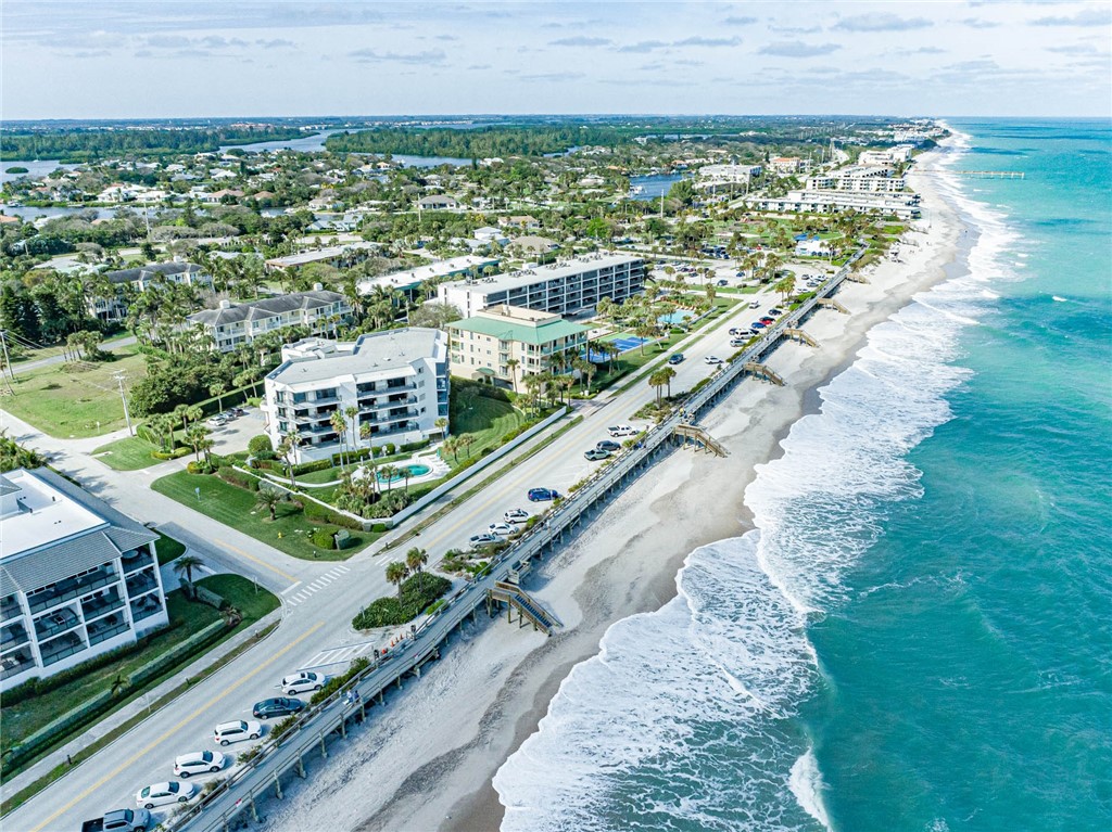 a view of a city with an ocean