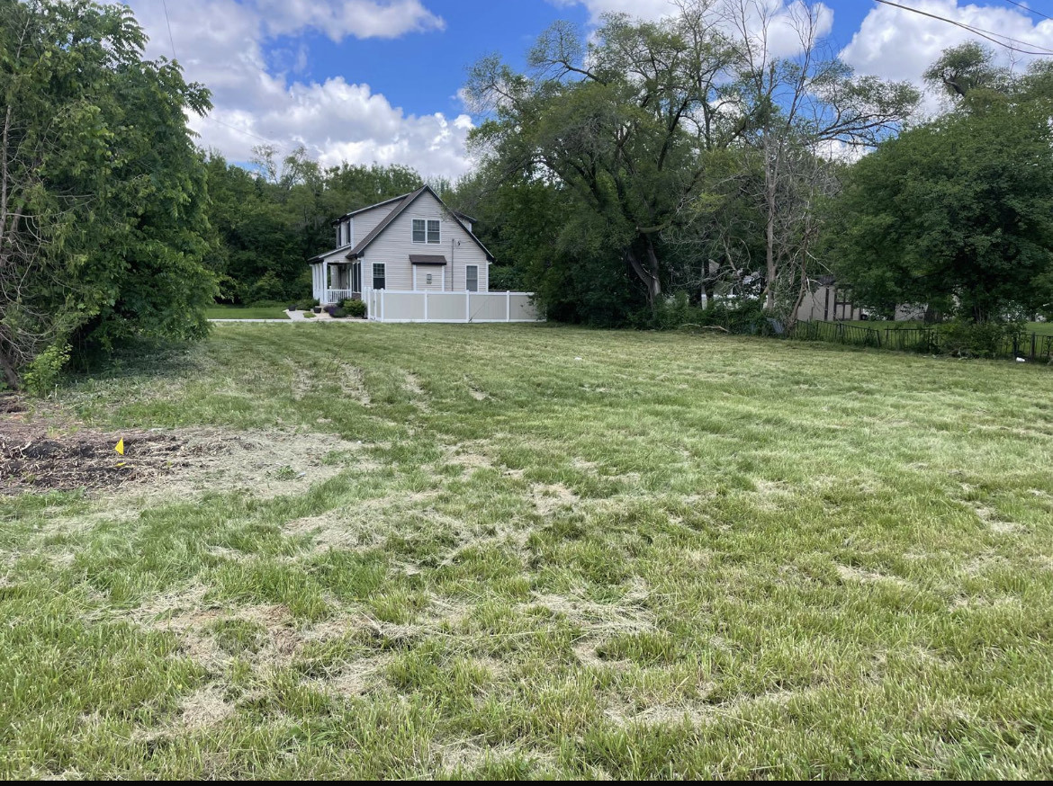 a house view with garden space