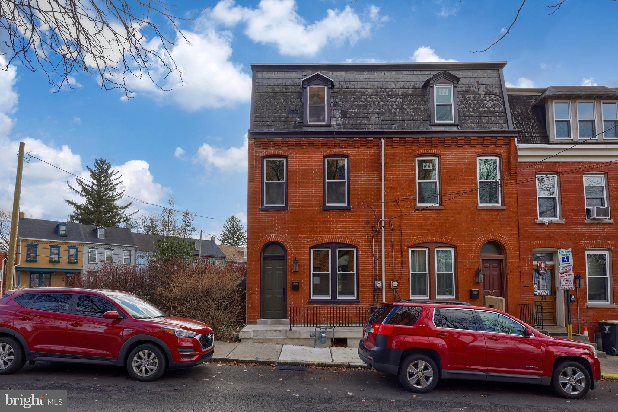 a car parked in front of a house