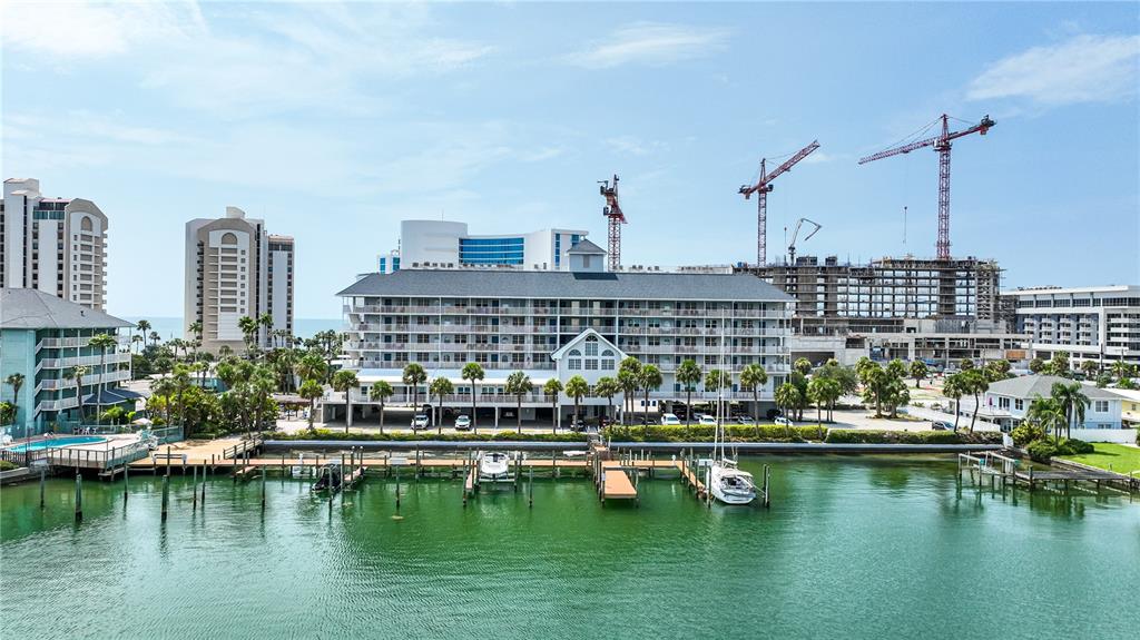 a view of water with tall building