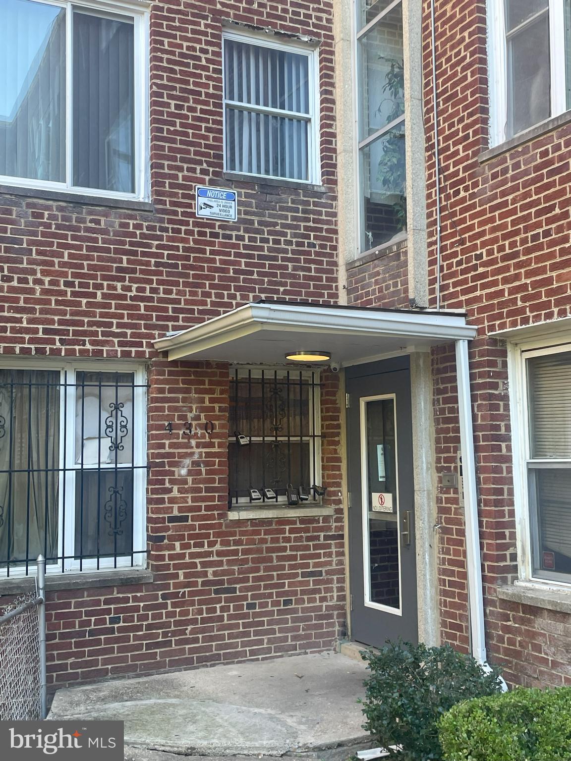 a view of brick building with a window