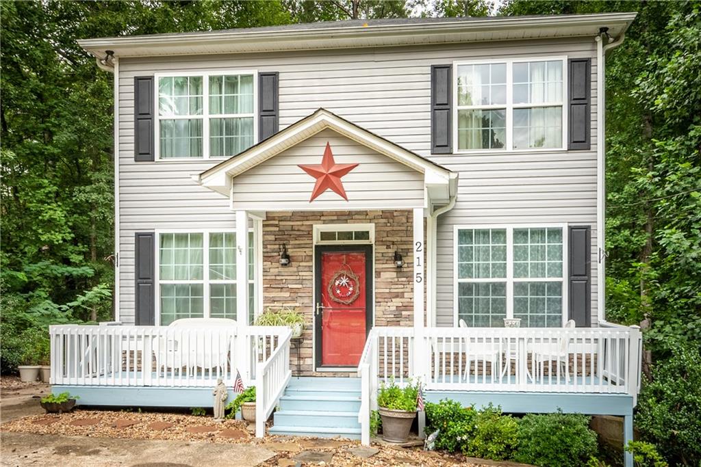 a front view of a house with a porch