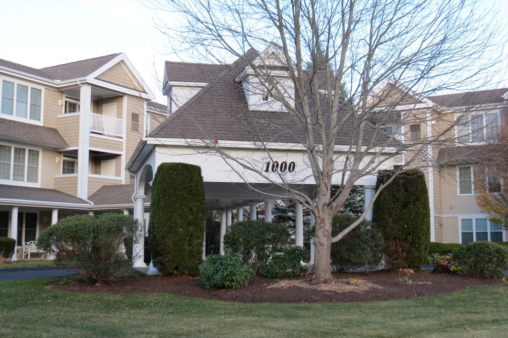 a view of a building with a garden