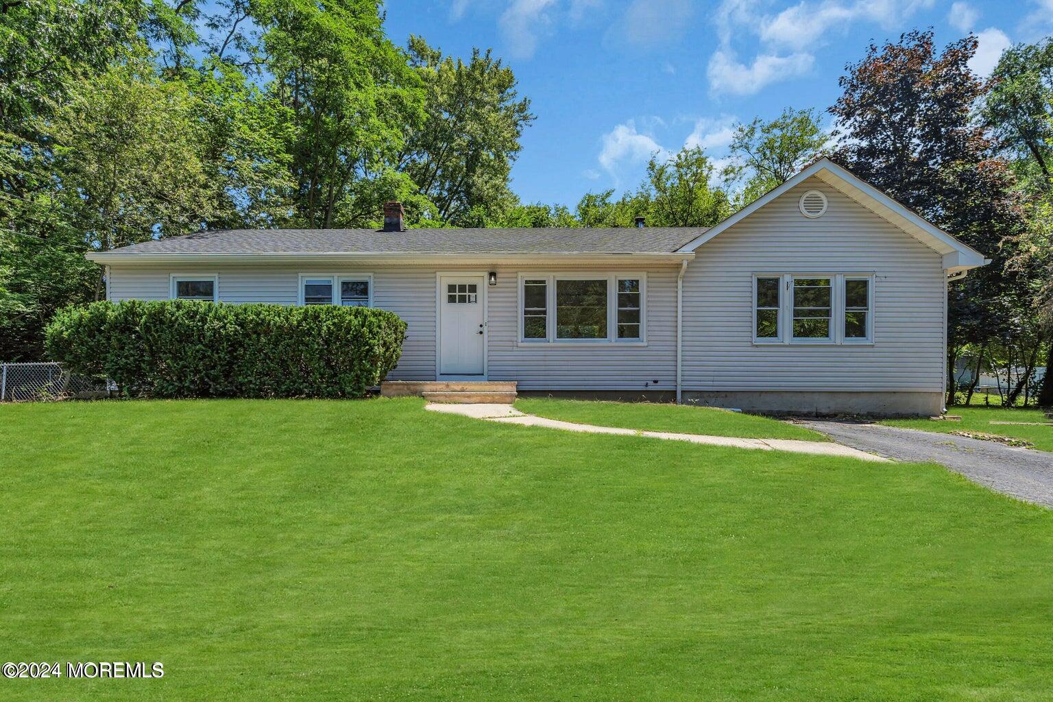 a view of outdoor space yard and front view of a house