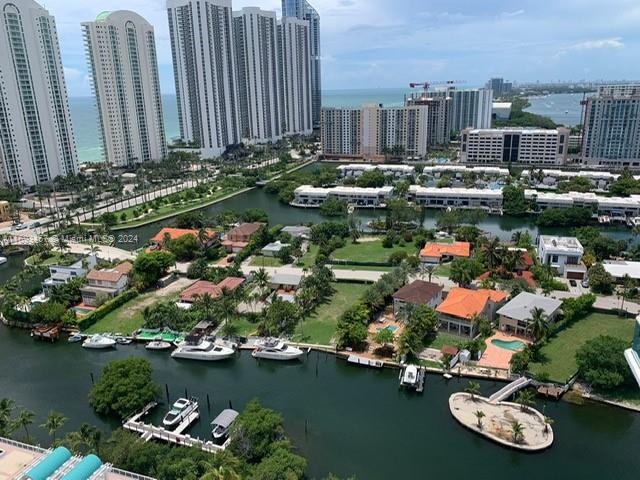 an aerial view of a house with yard swimming pool and outdoor seating