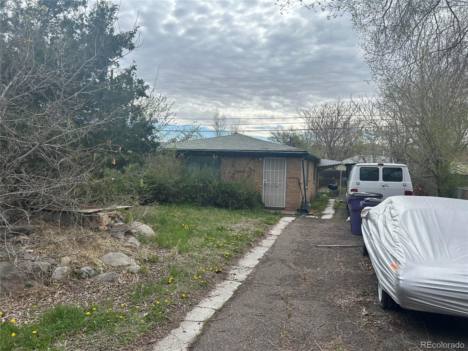 a view of a backyard with a tv