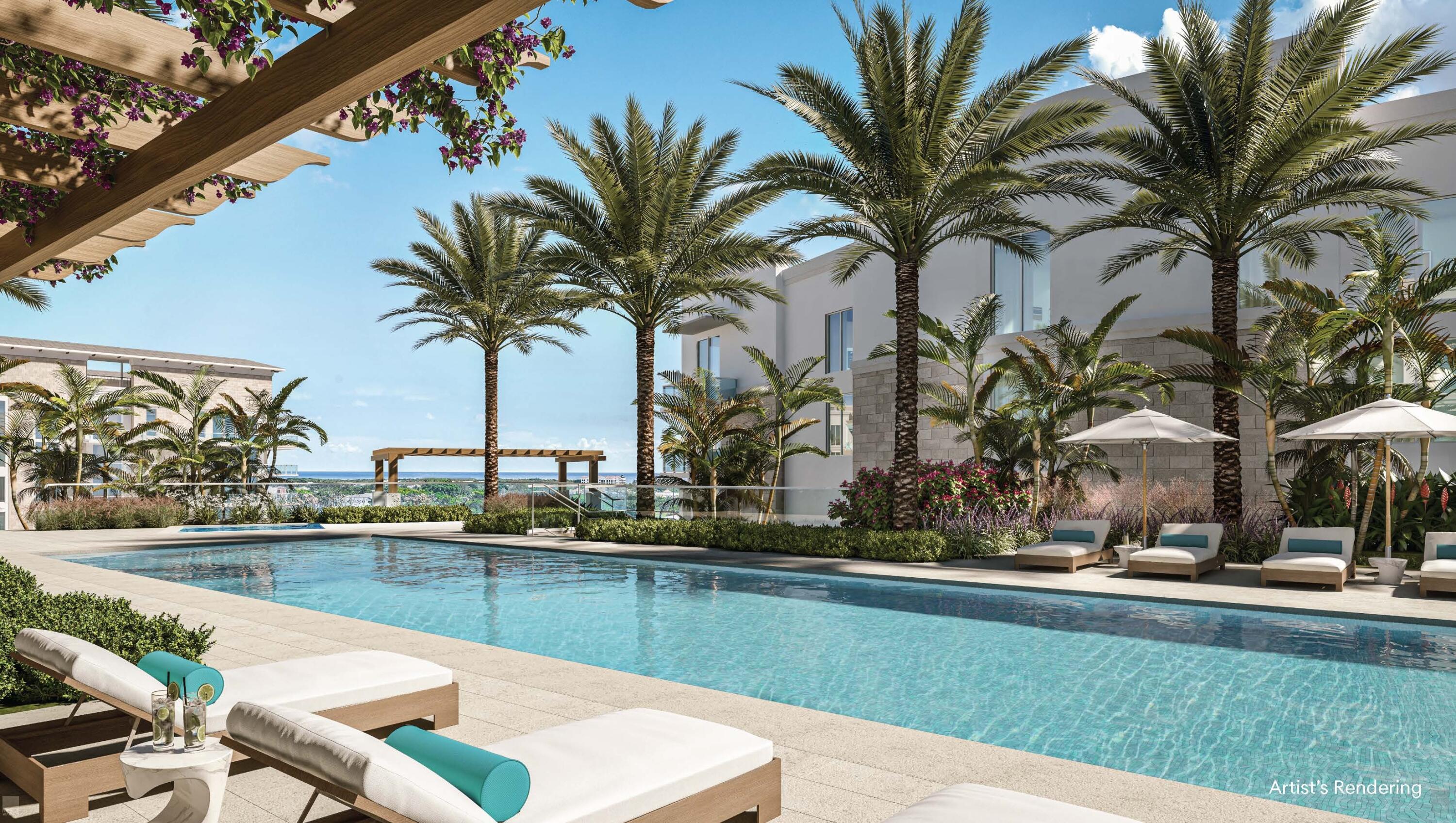 a view of swimming pool with a table and chairs