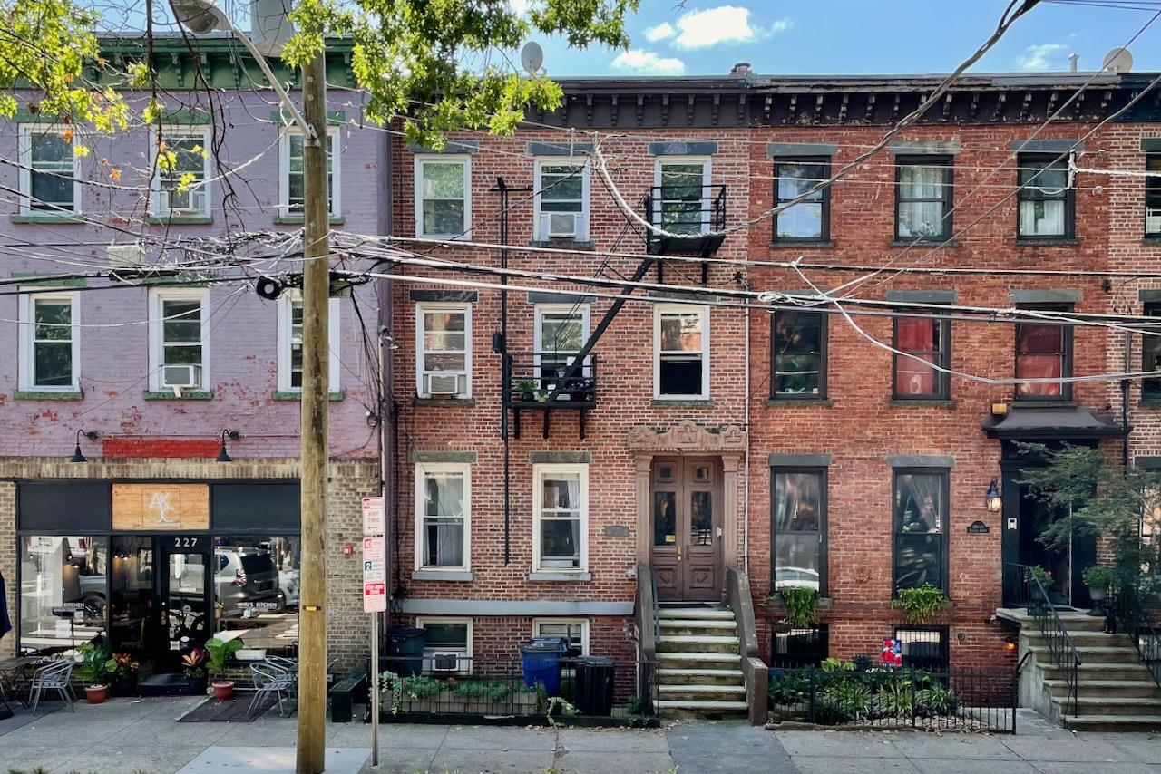 a view of a building with a street