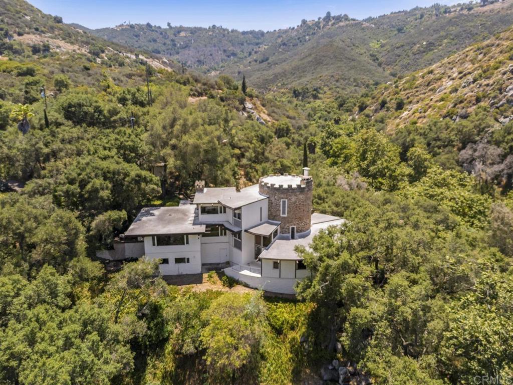 a view of a house with a mountain