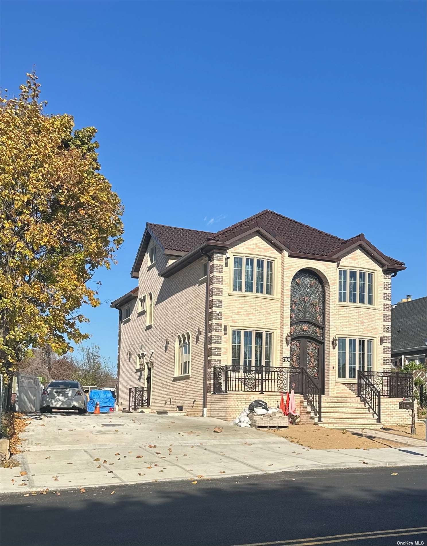 a view of a house with a street