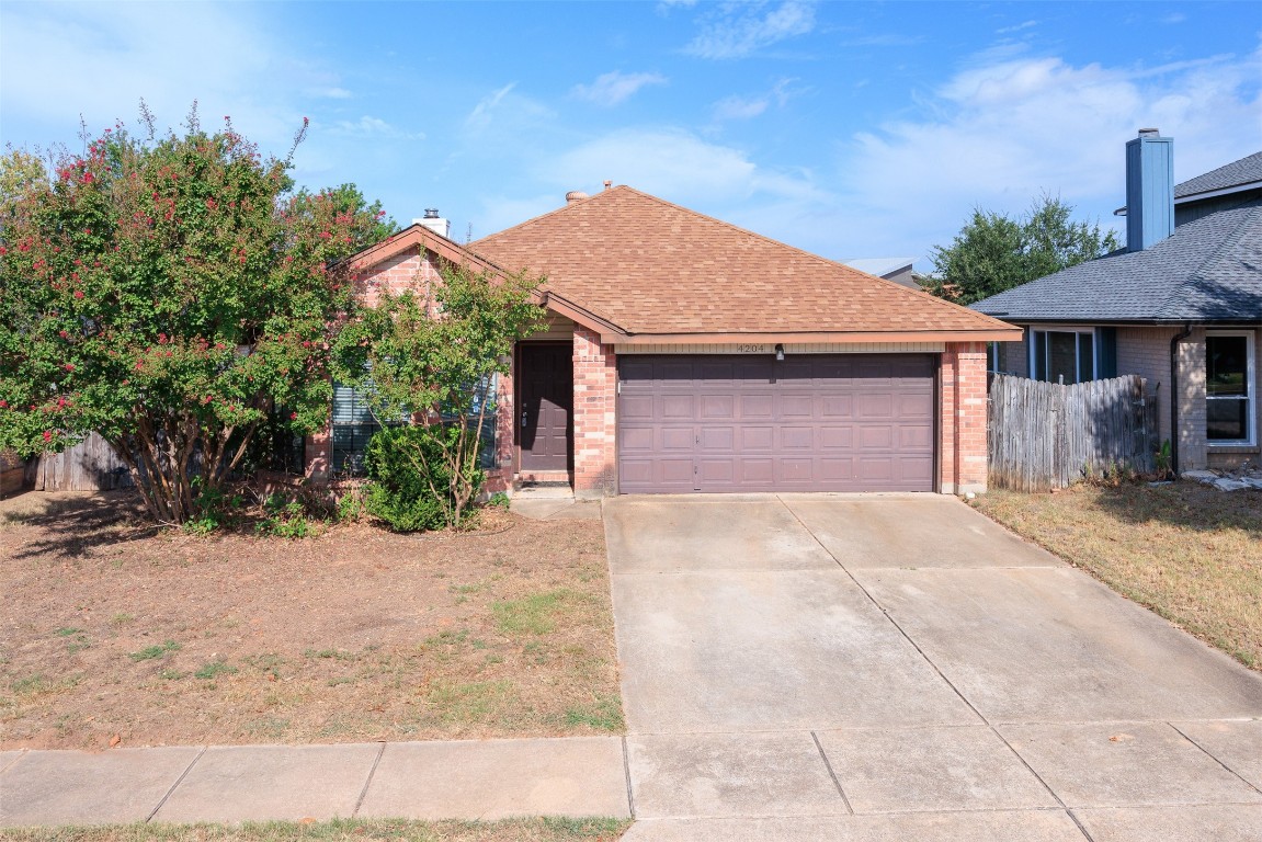 cute single story with bay windows at front