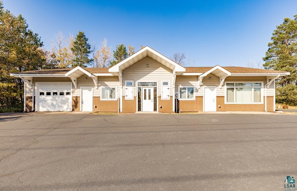 Single story home with a garage