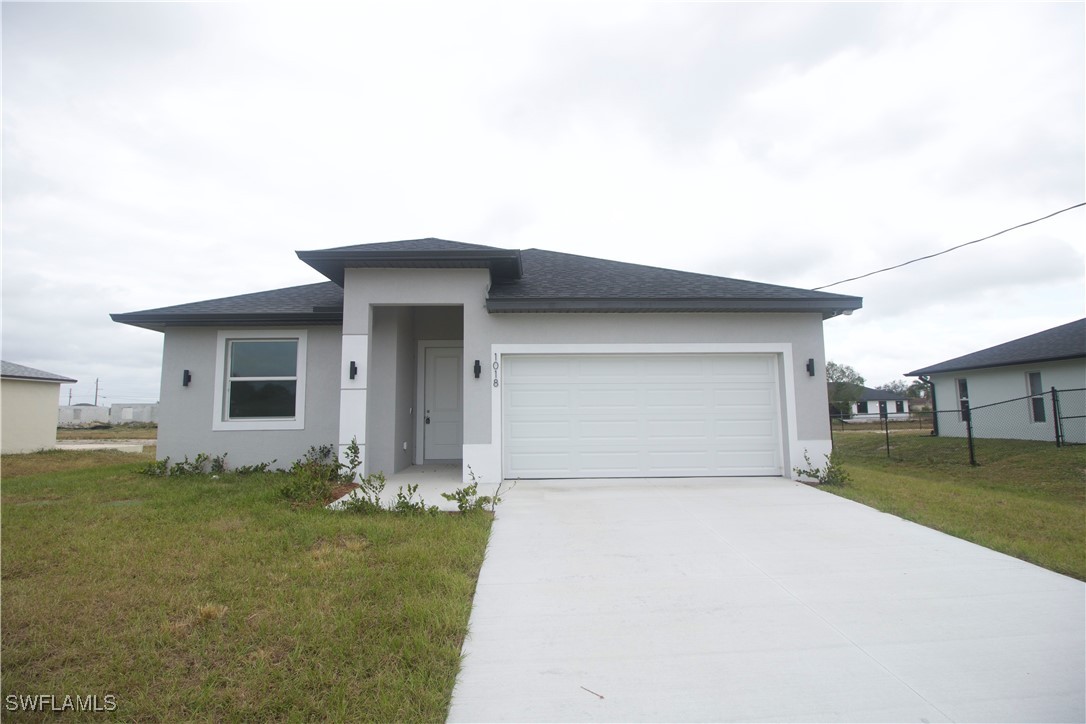 a front view of house with yard