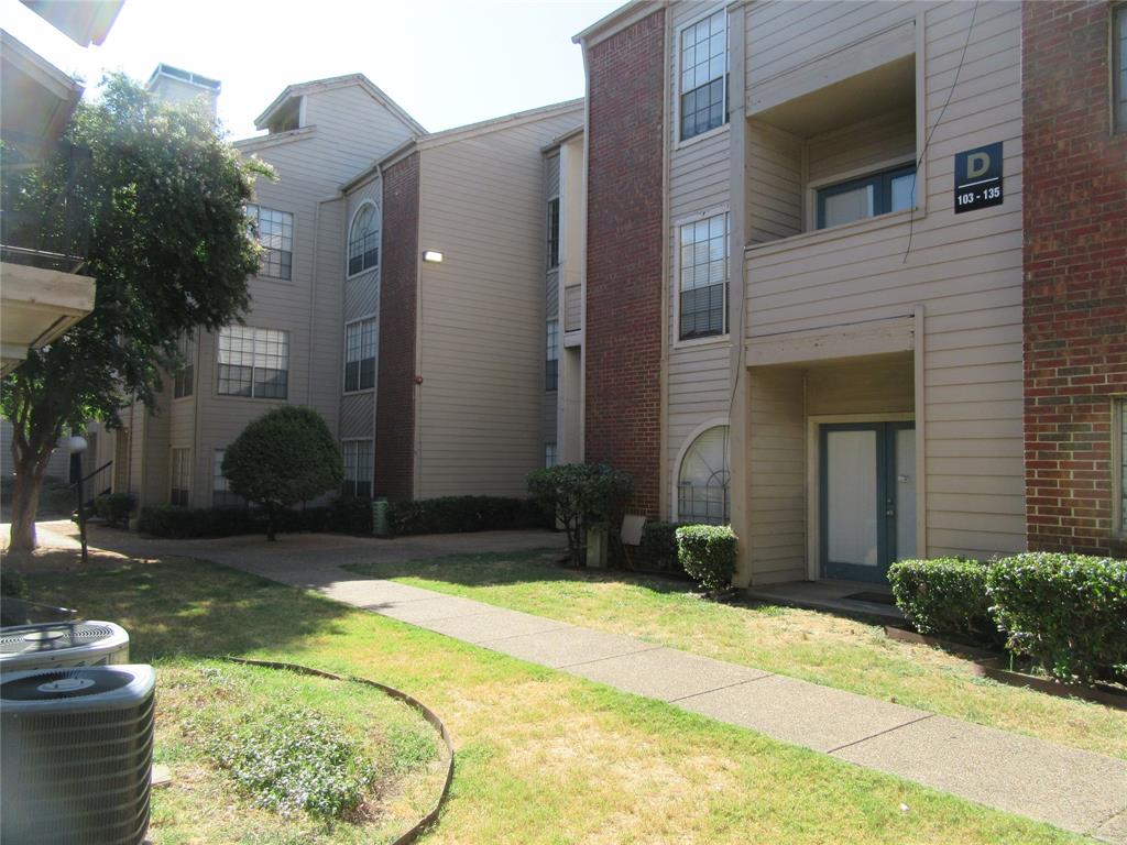 a view of a backyard of the house