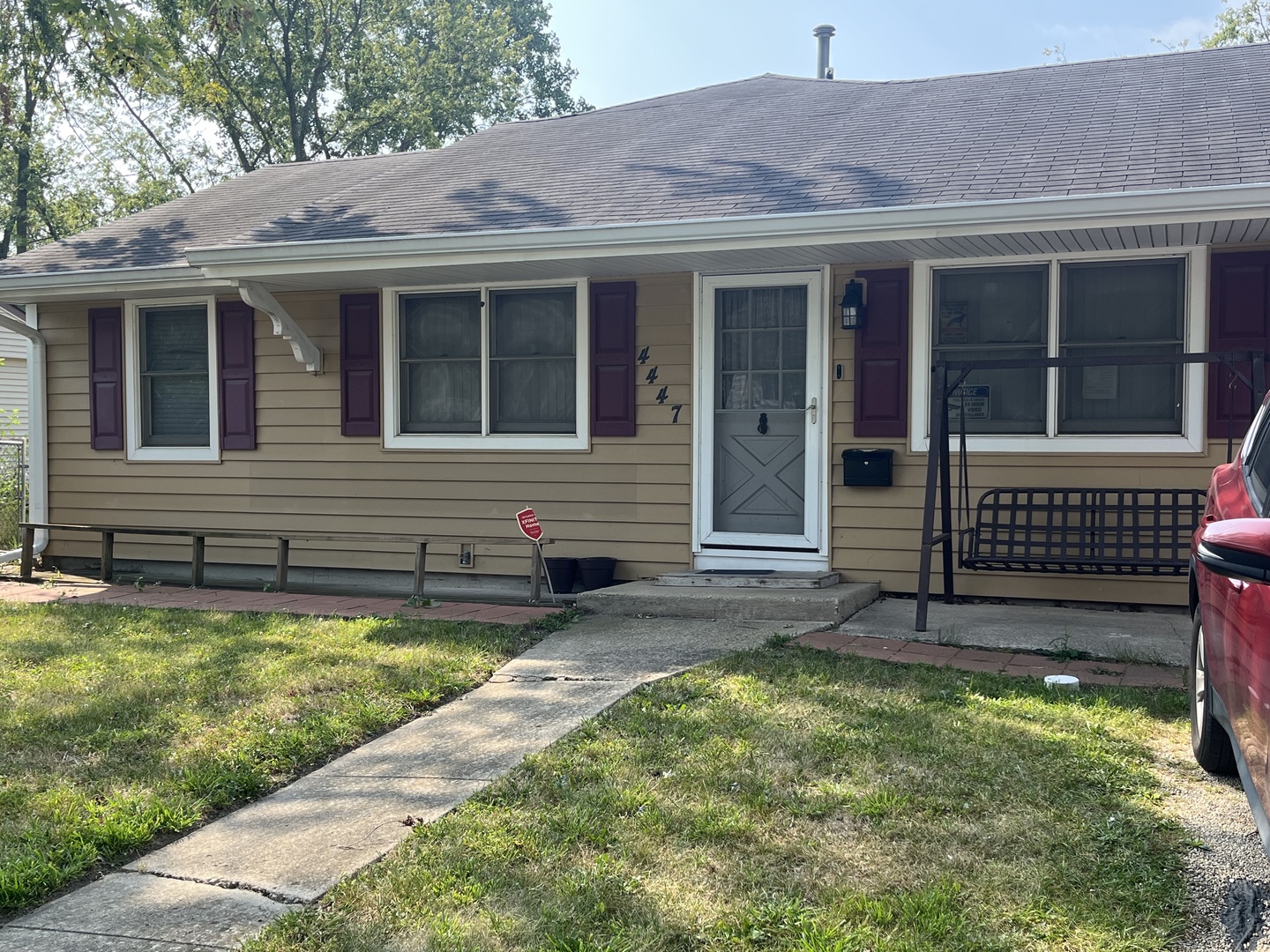 a view of house with front door